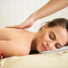 Woman receiving relaxing back massage